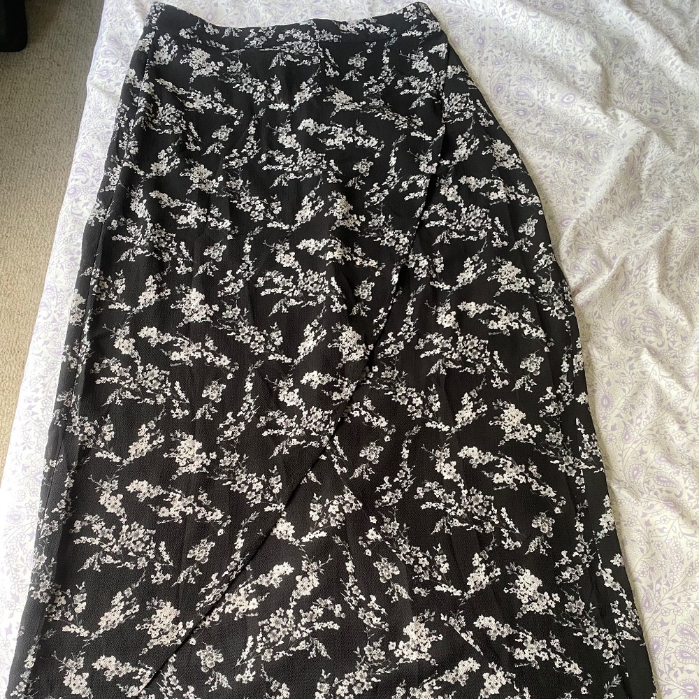 Asymmetric wrap skirt